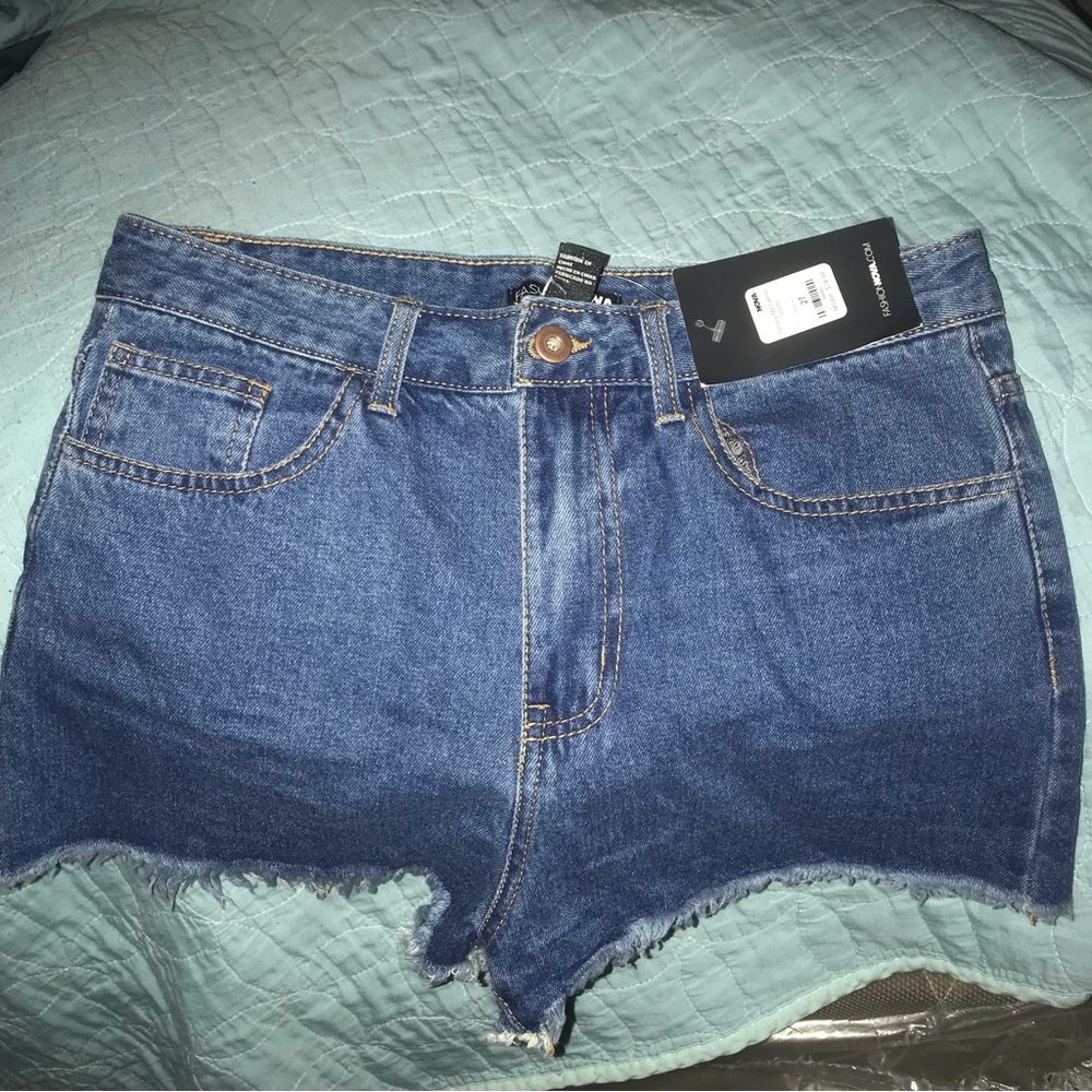“ Simply me “ FashionNova denim shorts . Size 27 brand new with tag. Never used